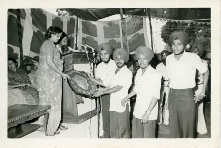 Jasbir Singh Kang Receiving An Award For Red Cross Volunteer Work, Patiala, Punjab, 1978.  Courtesy of the Kang Family.
