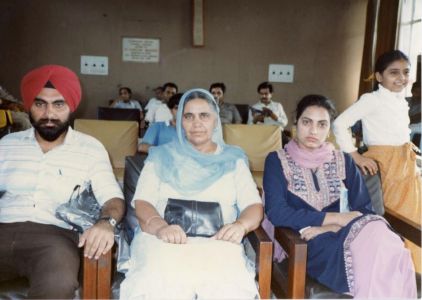 Jasbir Singh Kang Waiting With His Mother and Sister at the Chandigarh Airport Before Leaving for the U.S., 1986.  Courtesy of the Kang Family.